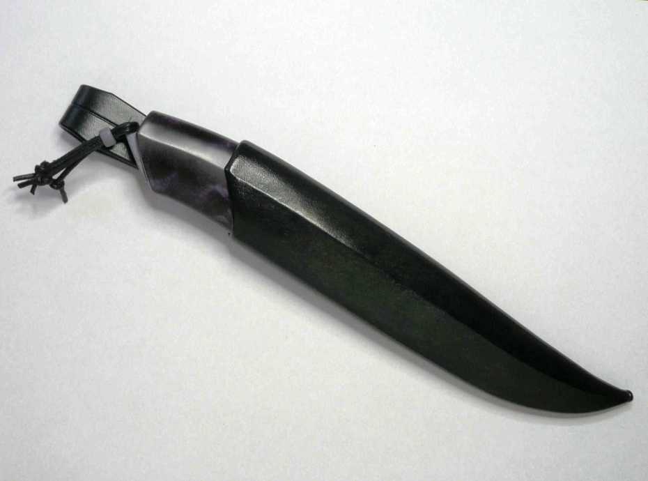 a dyed rawhide leather sheath.